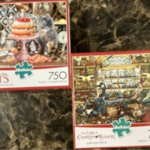 2 FOR 1!  BUFFALO CAT PUZZLES.  PLEASE LEAVE THE LID OFF & ELMER & LORETTA USED